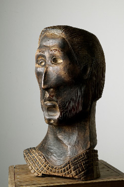 Nº inv. 1077: Retrato de Manolo. Acisclo Manzano Freire. 2º ¼ Século XX. Madeira. 52 alt. x 23 cm anch